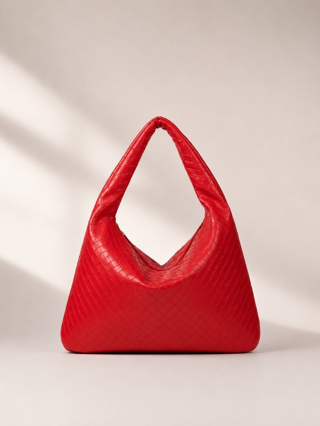 Sac à main porté épaule effet tressé