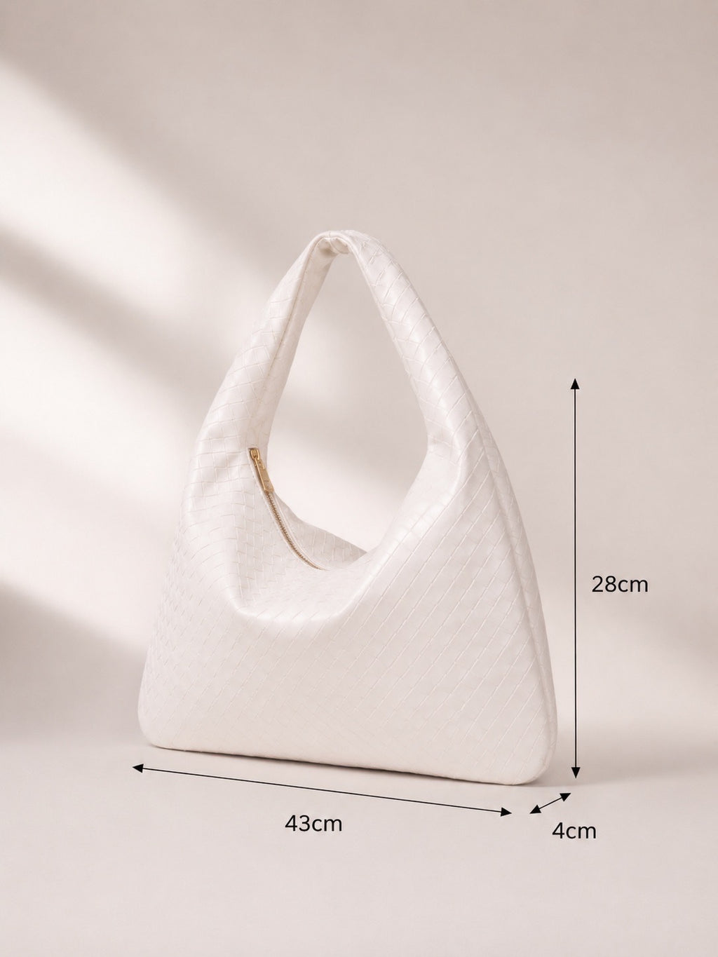 Sac à main porté épaule effet tressé