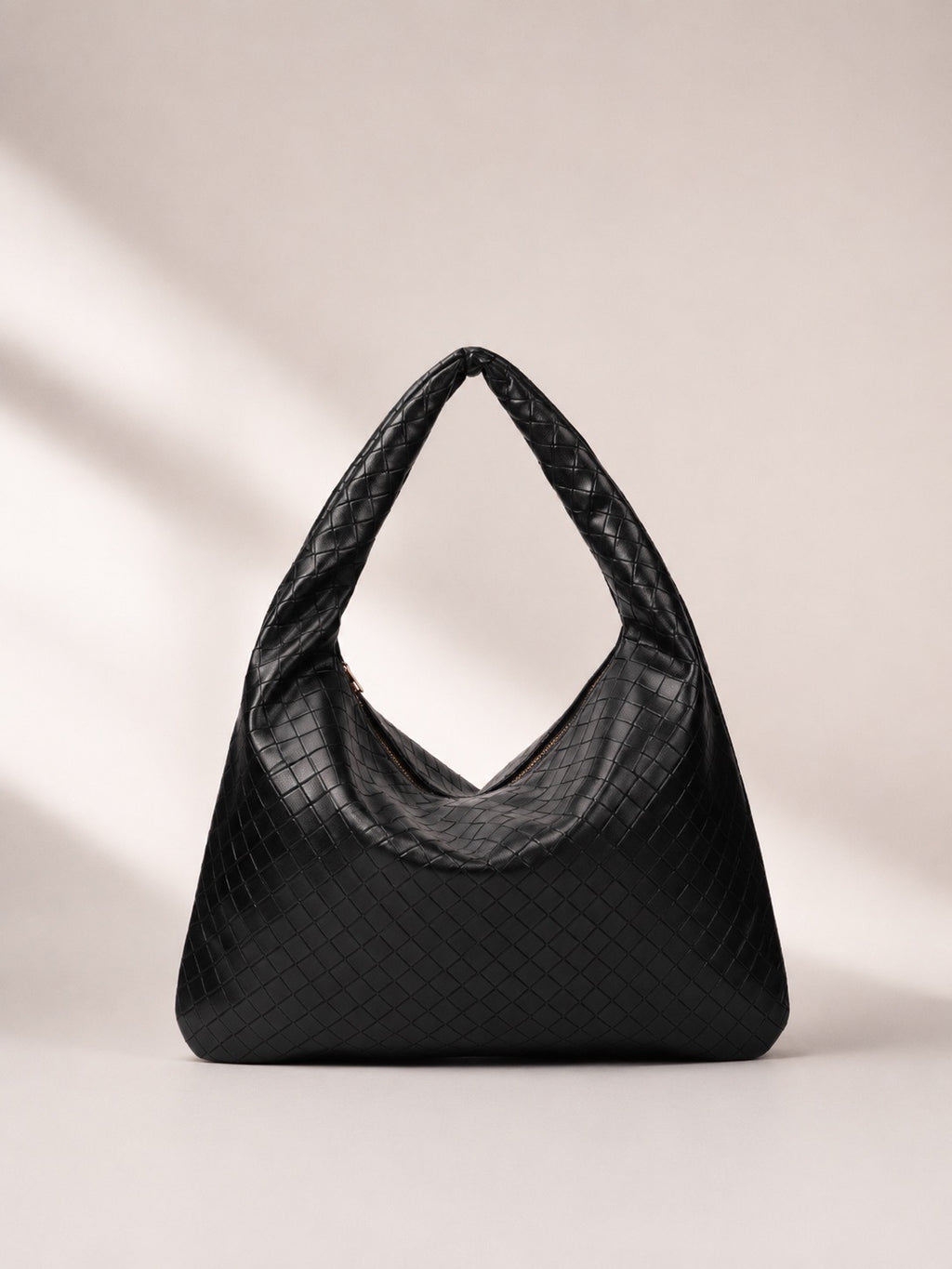Sac à main porté épaule effet tressé