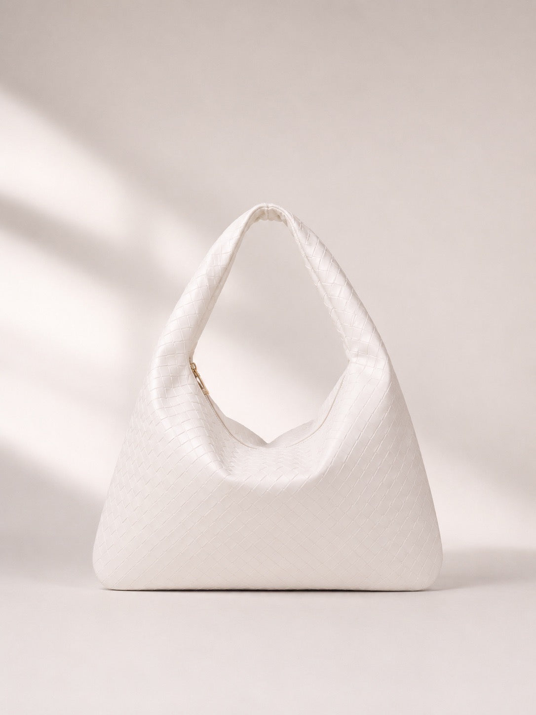Sac à main porté épaule effet tressé