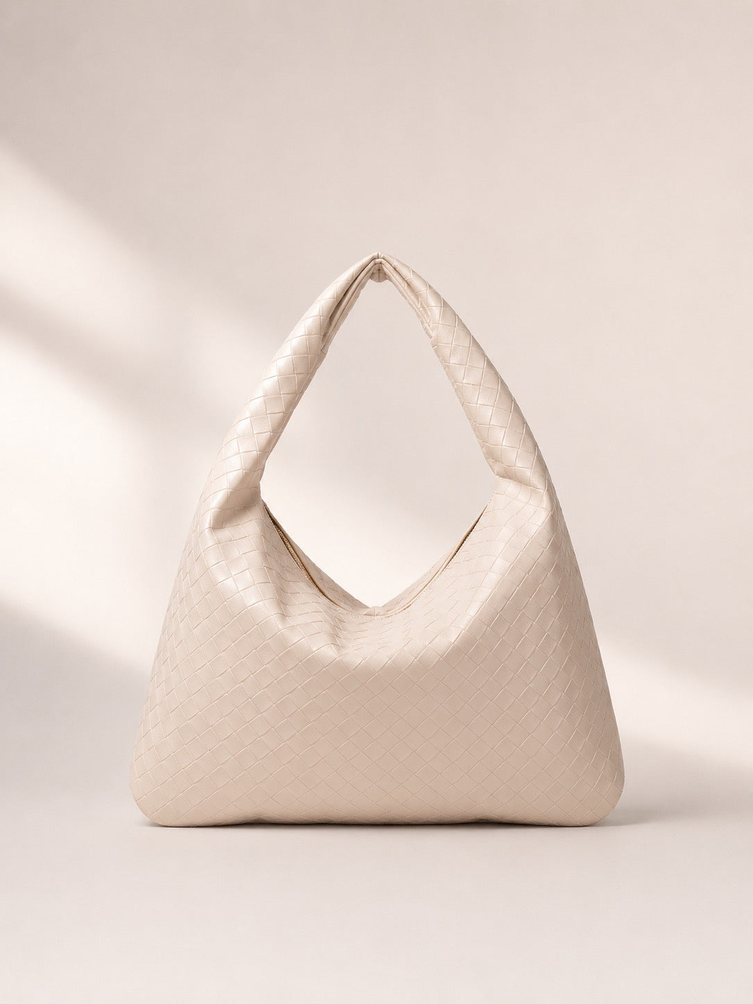 Sac à main porté épaule effet tressé