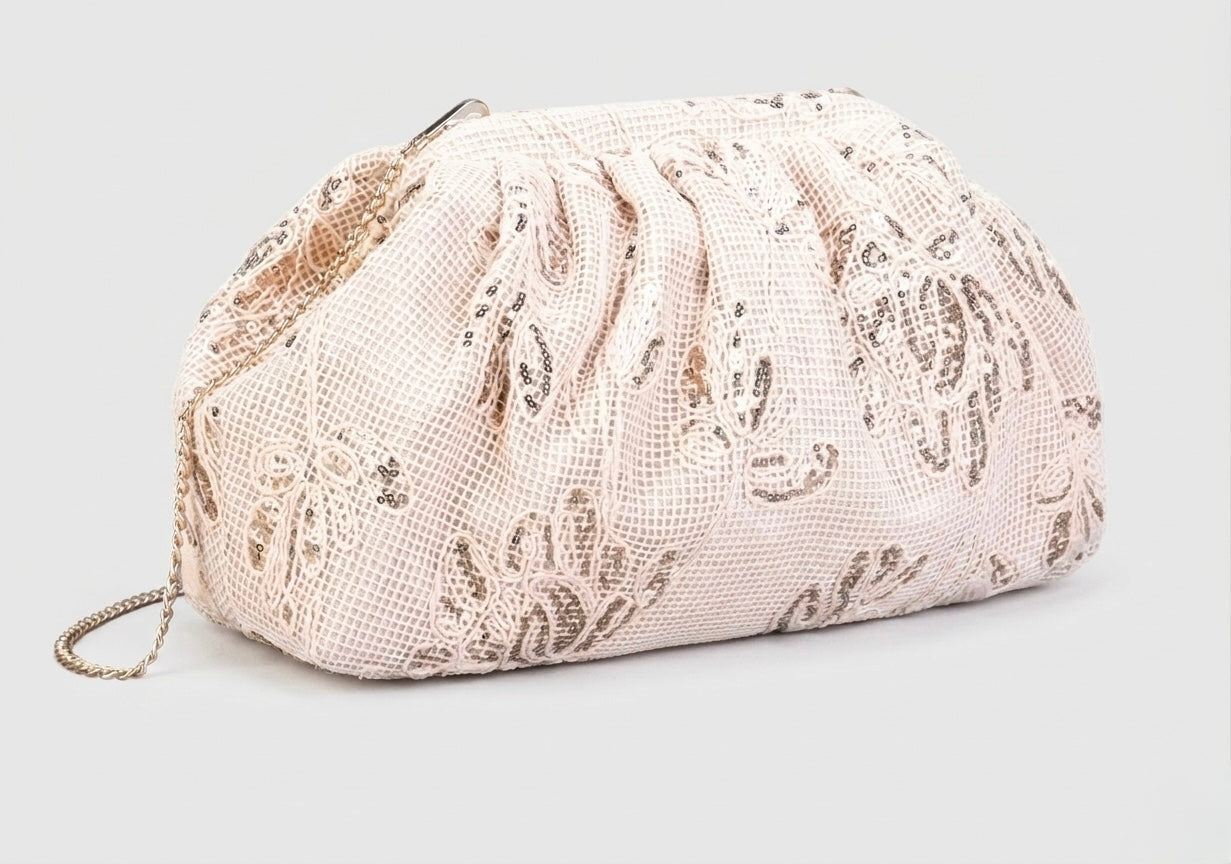 Sac à main clutch porté main en tissu orné de motifs floraux et sequins